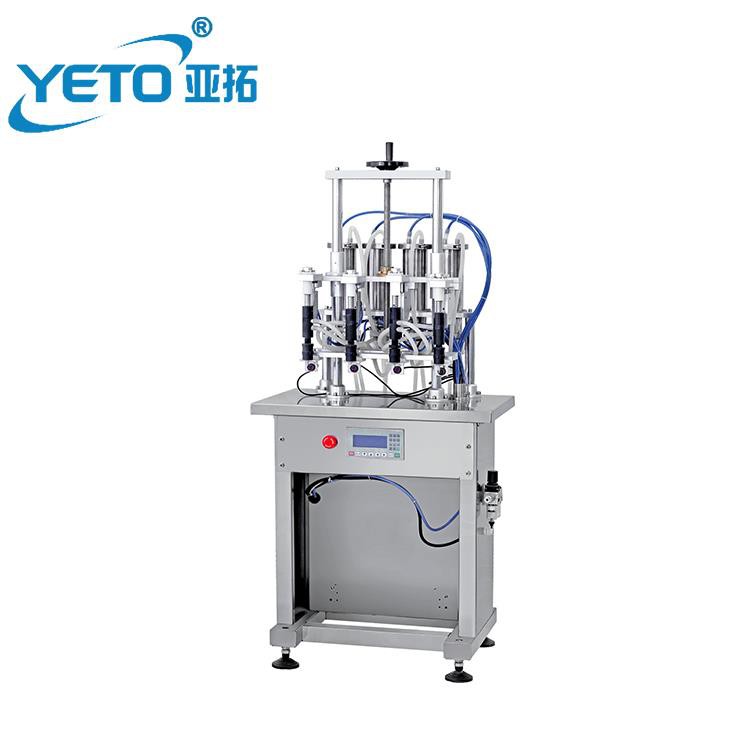 เครื่องบรรจุขวดน้ำหอมสี่หัวฉีดไปดูไบ